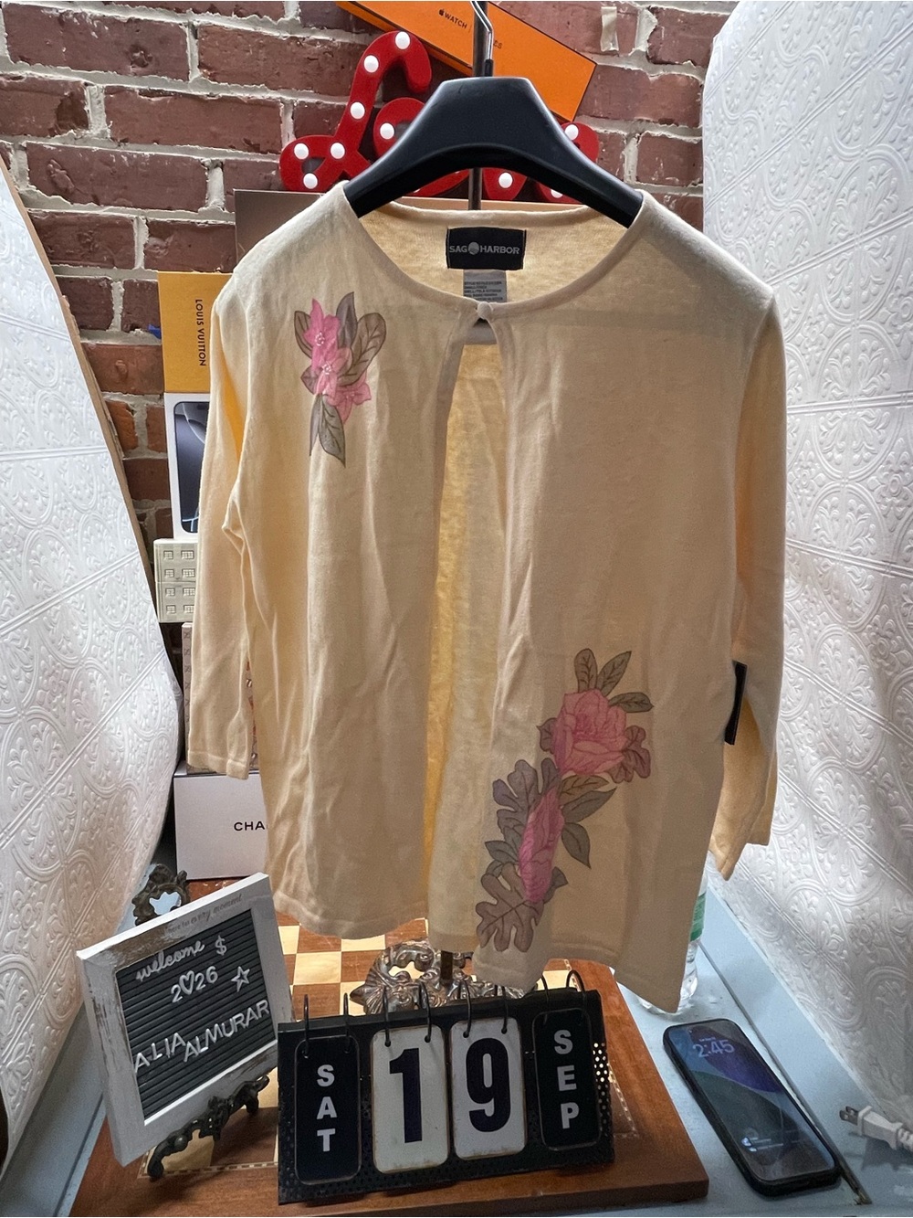 Sag Harbor cardigan accented with delicate pink floral embroidery